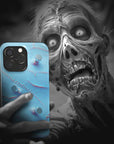 A zombie takes a selfie with a Bride Monster Flesh phone case!  Available for iPhone, Samsung Galaxy, and Google Pixel devices.  Muhahaha! presents the perfect spooky, Halloween gift.  Every case has double layers for extra durability and protection while the clear, open ports stay out of your way when it comes to charging. Choose between matte or glossy finish. (pictured: iPhone 15 pro with a Bride Monster Flesh phone case)