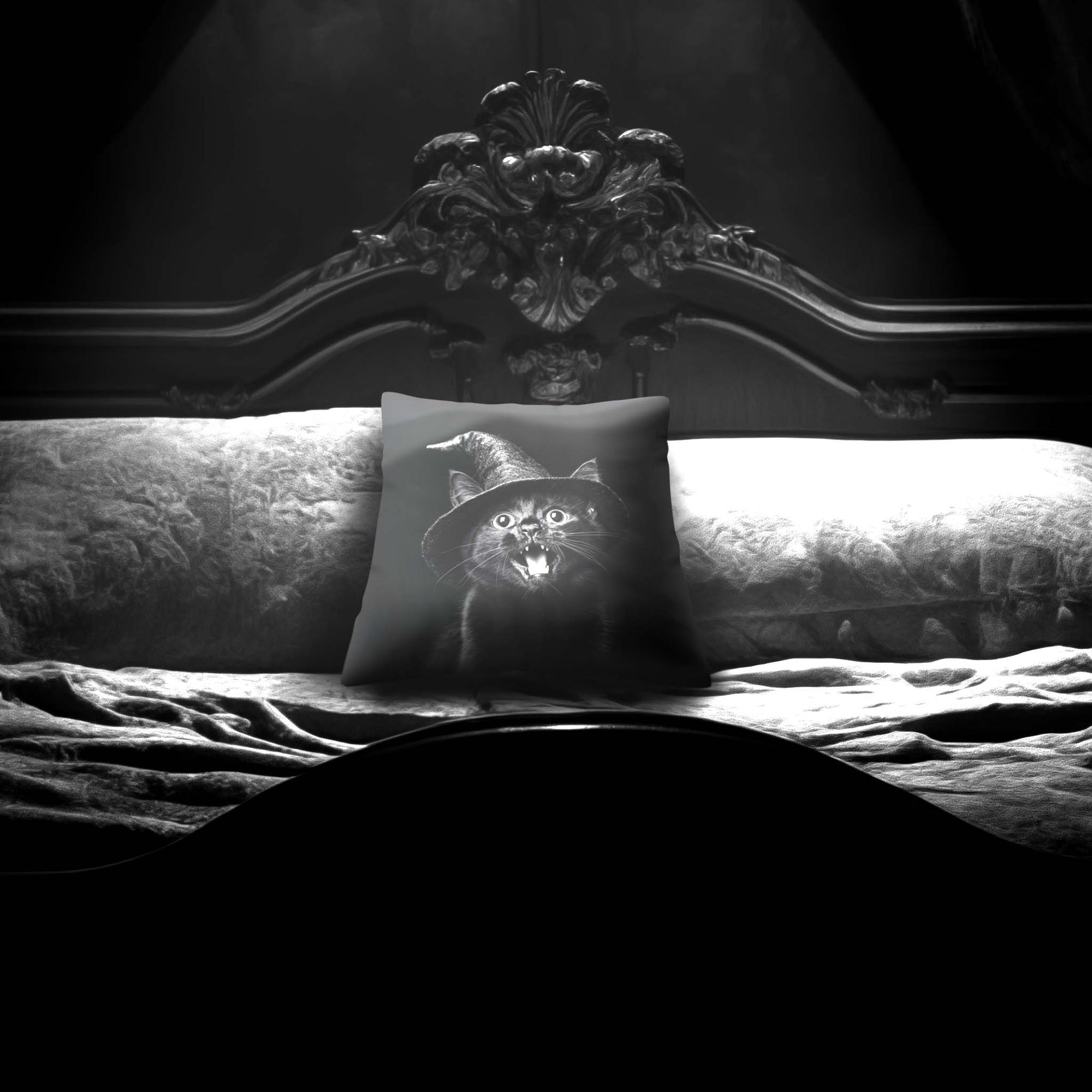 Cat Peekaboo pillow by Muahaha!  Black and white photo of the 16x16 faux suede pillow showing a cat wearing a witch hat's face resting on an antique bed in a victorian mansion.  The perfect gothic, horror gift!