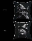 Image showing the front and back of Cat Peekaboo Pillow.  The front shows a cat wearing a witch hat with its hands covering his face.  The back shows the cat's cute meowing face!  Black and white artwork on a 16x16 faux suede pillow.  The perfect adorable horror, goth decor gift from Muahaha!