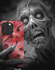 A zombie takes a selfie with a Horny Monster Flesh phone case!  Available for iPhone, Samsung Galaxy, and Google Pixel devices.  Muhahaha! presents the perfect spooky, Halloween gift.  Every case has double layers for extra durability and protection while the clear, open ports stay out of your way when it comes to charging. Choose between matte or glossy finish. (pictured: iPhone 15 pro with a Horny Monster Flesh phone case)
