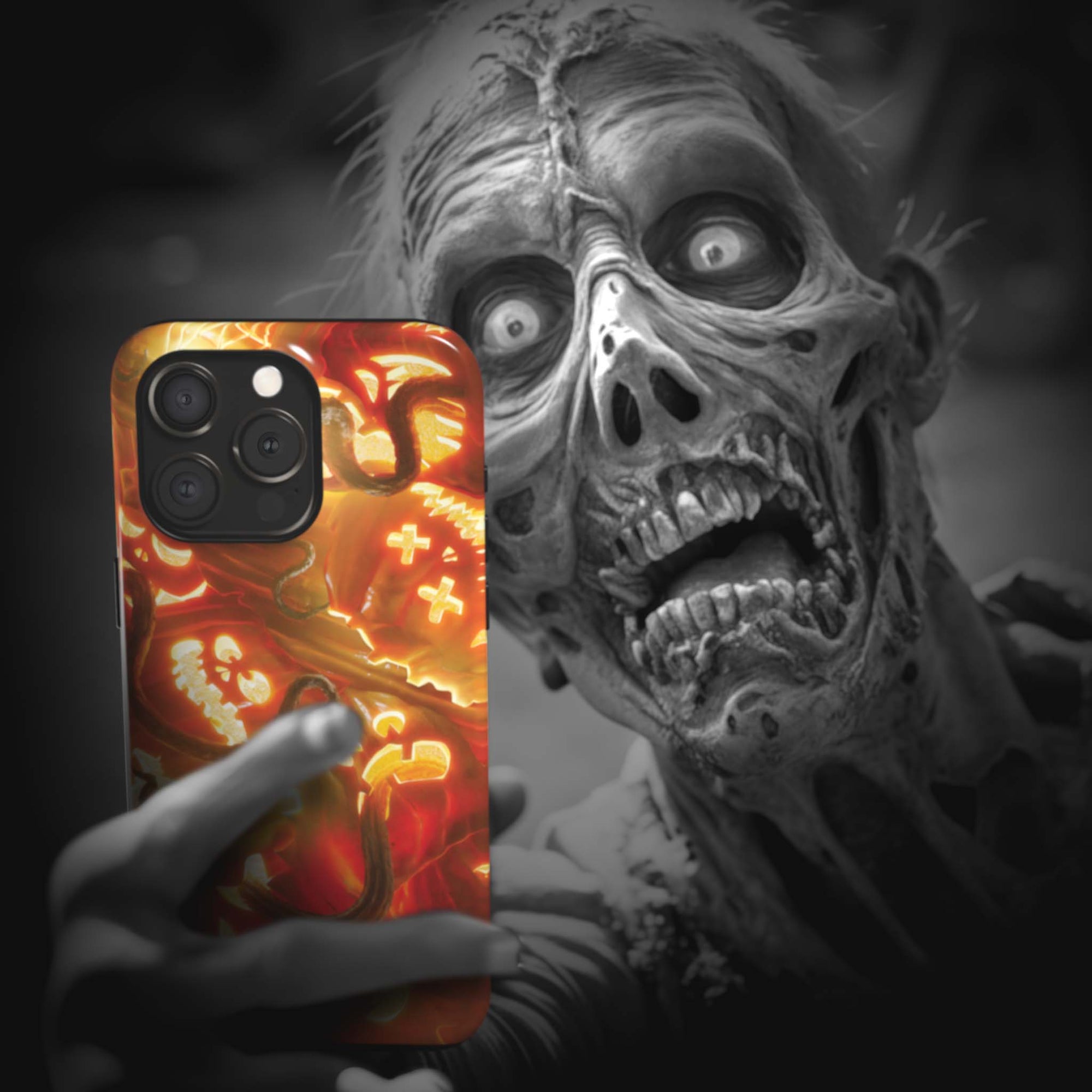 A zombie takes a selfie with a Jack-O'-Lantern Monster Flesh phone case!  Available for iPhone, Samsung Galaxy, and Google Pixel devices.  Muhahaha! presents the perfect spooky, Halloween gift.  Every case has double layers for extra durability and protection while the clear, open ports stay out of your way when it comes to charging. Choose between matte or glossy finish. (pictured: iPhone 15 pro with a Jack-O'-Lantern Monster Flesh phone case)