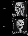 Image showing the front and back of Skeleton Peekaboo Pillow.  The front shows a skeleton with its hands covering his face.  The back shows the skeleton's diabolical face!  Black and white artwork on a 16x16 faux suede pillow.  The perfect spooky horror, goth decor gift from Muahaha!