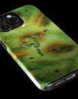 Zombie Monster Flesh phone case!  For iPhone, Samsung Galaxy, and Google Pixel devices.  Muhahaha! presents the perfect spooky, Halloween gift.  Every case has double layers for extra durability and protection while the clear, open ports stay out of your way when it comes to charging. Choose between matte or glossy finish. (pictured: iPhone 15 pro rocking a Zombie Monster Flesh phone case)
